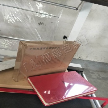买笔记本热收缩膜包装机 就选山东喜鹊包装 我们是厂家 **质量